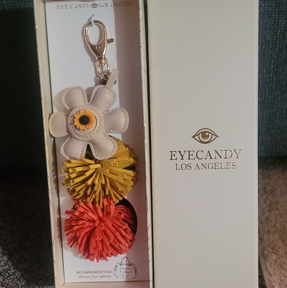 Eye Candy Los Angeles Floral Bag Charm with Yellow and Red Pom Poms